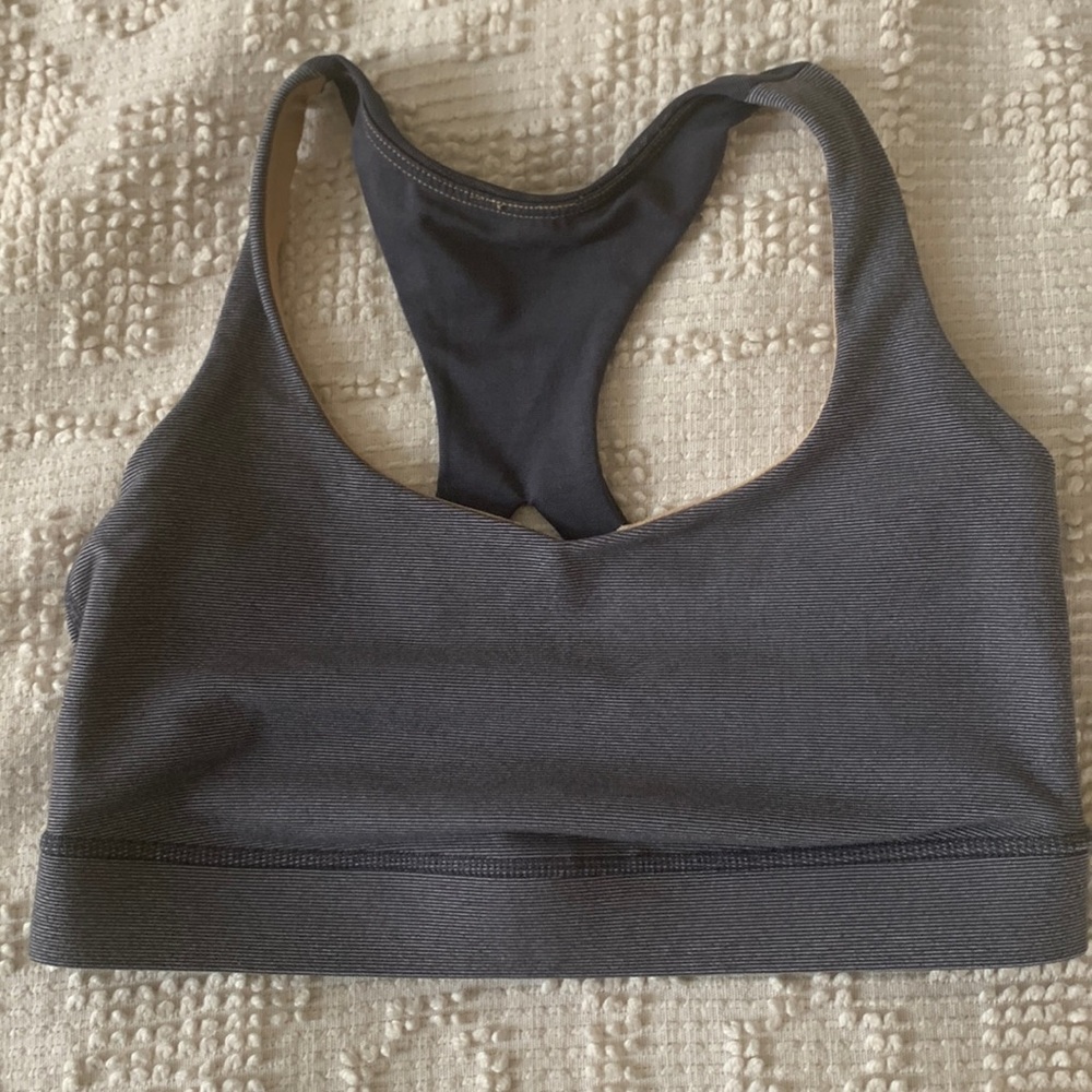 Like new Lululemon gray sports bra with mesh detail